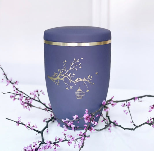 Beautiful lilac urn with a scene of golden branches and a birds