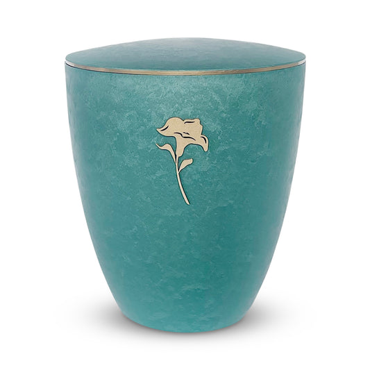 Stunning emerald green coloured urn for ashes with an elegant golden lily.