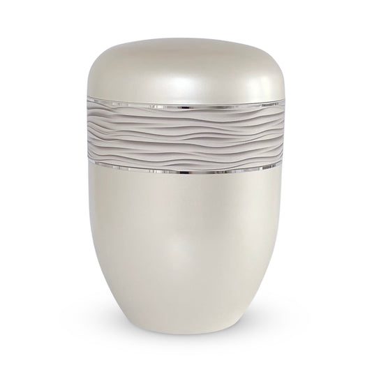 White subtly pearlised urn  for ashes with an elegant sand pattern.