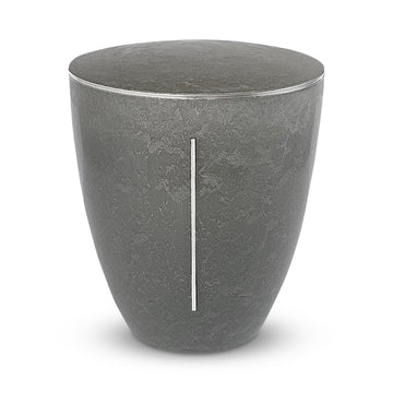 Elegant and sculptural stone coloured cremation urn with a silver pillar of light symbol.
