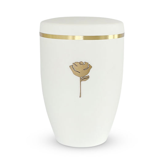 Beautiful white funeral urn with a golden rose symbol.