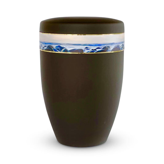 Elegant black urn for ashes with a photo band of a serene seascape.
