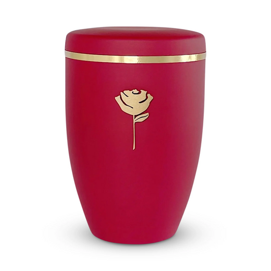 Beautiful red cremation urn with an elegant golden rose symbol and a delicate golden band.