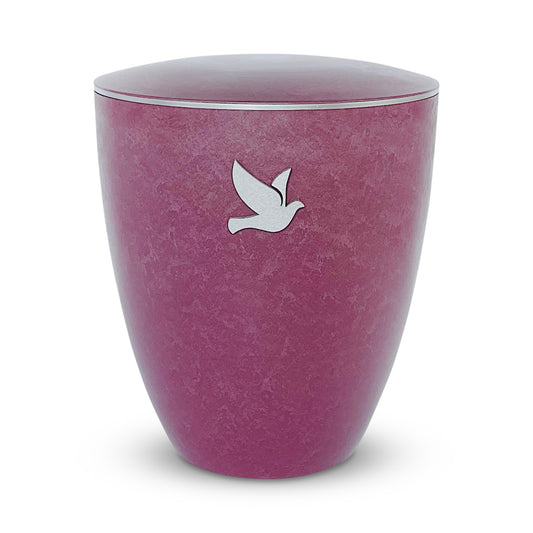 Beautiful rose coloured urn for ashes with a delicate silver dove.