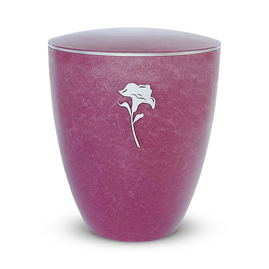 Elegant rose coloured funeral urn with a delicate silver lily.