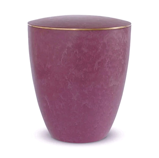 Elegant vibrant rose coloured urn for ashes with a delicate gold ring.