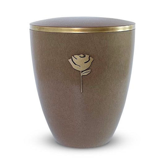 Beautiful cremation urn in a dark sand colour with a golden rose.
