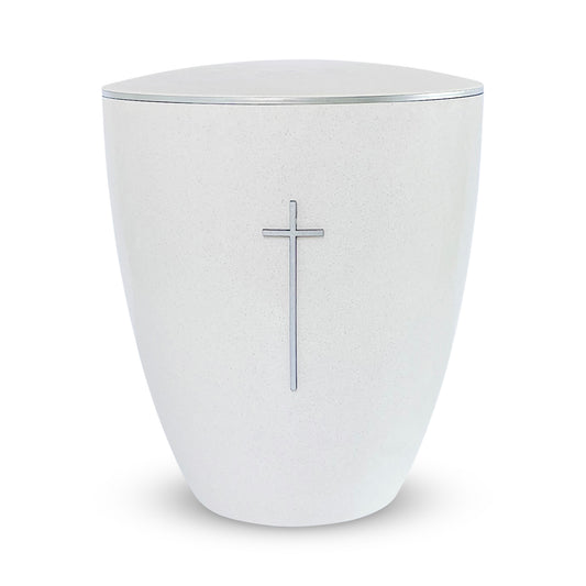 Beautiful off-white urn for ashes with a silver cross and a delicate silver ring around the lid.