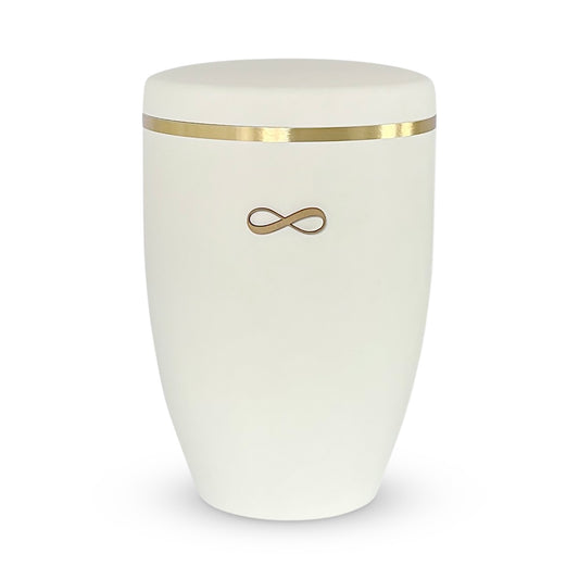 Beautiful white urn for ashes with golden infinity symbol.