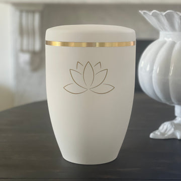 White Urn for Ashes with a golden Lotus Flower